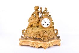 A late 19th century gilt metal mantel clock.