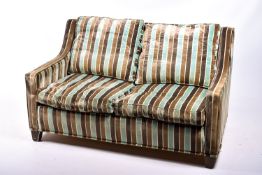 A contemporary two seater sofa.