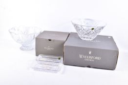 Four pieces of Waterford crystal and two Waterford boxes.