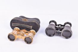 Two pairs of opera glasses.