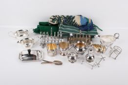 A small group of silverplated items including toast racks.