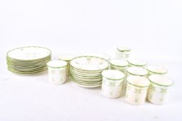 An Art Deco Peacock Pottery tea service.