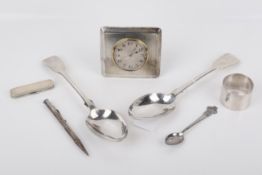 A collection of silver and white metal.