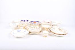 A collection of assorted 19th century cups and saucers.
