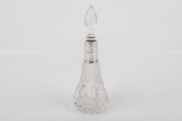 A 20th century silver mounted perfume scent bottle.
