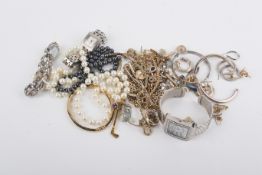 A collection of costume jewellery and wristwatches.
