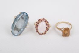 Three 9ct gold stone set dress rings.