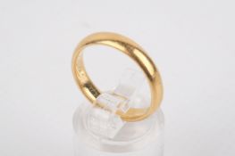 A 22ct gold wedding band. Size P/Q, 5.5g.