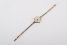 A 9ct gold Vertex Revue lady's bracelet wristwatch.