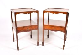 A pair of 20th century Georgian style mahogany night stands.