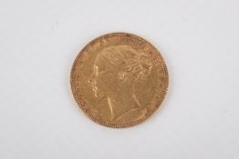A 1873 gold sovereign coin.