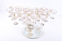 A collection of twenty-three mid-century Babycham glasses, etc.