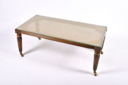 A 20th century French Louis XVI style cane top coffee table.
