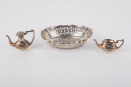 Three small pieces of silver.