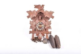 Schatz of Germany 'Black Forrest' cuckoo clock. Having three weights.