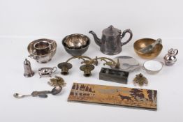 A small group of silverplated and metal items.