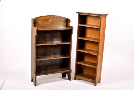 Two assorted oak freestanding bookcases with beading decoration.