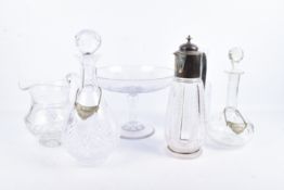 A group of assorted glassware including decanters and a claret jug, etc.