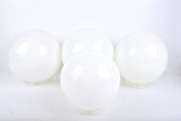 A group of four vintage white glass ceiling globe lamp shades. Max.