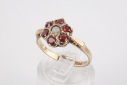 A 9ct gold and garnet ring.