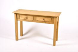 A small modern console table with two drawers,