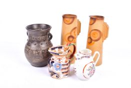 A group of five 19th and 20th century ceramics. Including a pair of Art Deco jugs, etc.