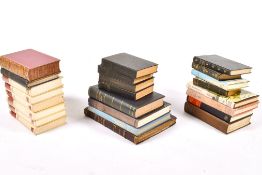 A collection of assorted vintage books.