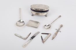 A collection of silver and white metal.