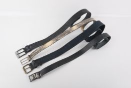 Four designer style belts.