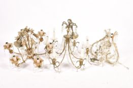 Three assorted crystal chandeliers.