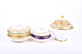 Three 20th century Noritake porcelain jars with covers.