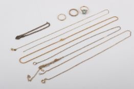 Three 9ct gold rings and a broken 18ct gold chain necklace.