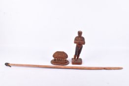 Three carved wooden collectables.