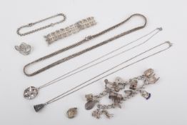 A collection of hallmarked white metal jewellery.