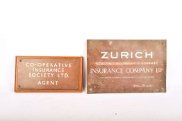 Two 20th century bronze company name plaques. Including 'Zurich' 30cm x 20cm , etc.