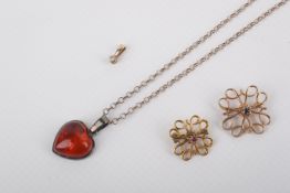 A small group of gold and silver jewellery.