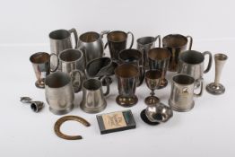 A group of assorted silverplated and pewter tankards, cups, etc. Various sizes and shapes.