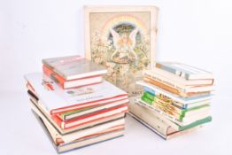 A box of assorted books on the subject of military uniforms and firearms