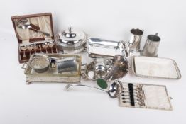 A small collection of silverplated table items.