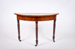 A Victorian mahogany demi-lune top console table.