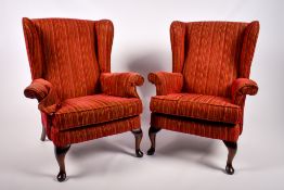 Two contemporary Parker Knoll wingback armchairs.
