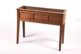 A vintage wooden framed rectangular planter.