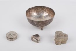 Four pieces of white metal.