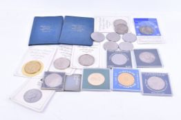 A small collection of commemorative coins.