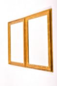 A pair of contemporary gilt framed wall mirror with faux bamboo moulding.