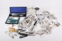 A quantity of assorted silverplated items, mostly flatware.