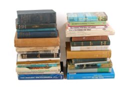 A collection of fishing books.