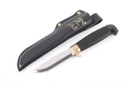 J. Marttiini, Finland knife with a black scabbard.