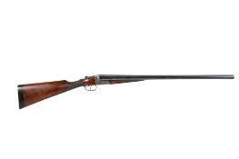 A Truelock & Harris side by side 12 bore shotgun. Half and three quarters chokes, 2.