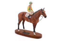 Horse Racing Interest - Beswick Nijinsky and Lester Piggot figure. Raised on an oval wooden base.